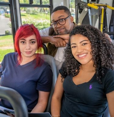 New Image group of friends riding on bus